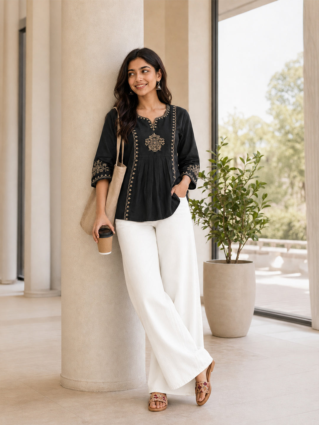 KISHRO Women Viscose Rayon Embroidered Regular Fit Peplum Top - Black Main image